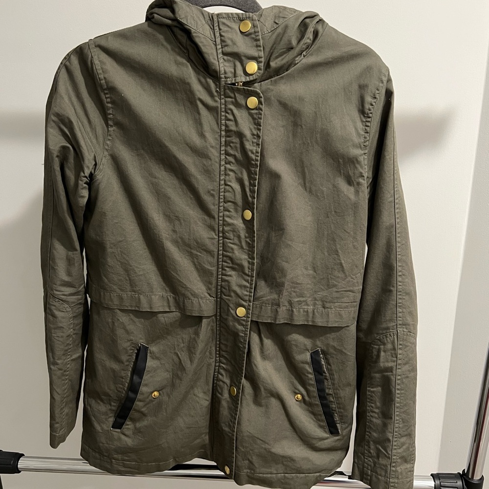 Olive green jacket with plaid hood